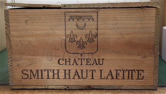 Twelve bottles of Chateau Smith Haut Lafite, 1979 in original wooden box,